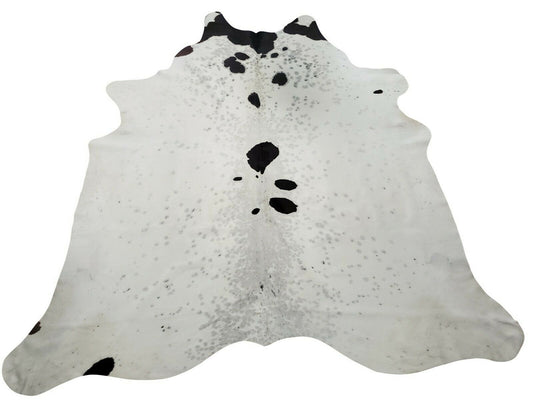 A cowhide rug is a spotted, large and exotic statement piece for any room. It's soft and smooth texture makes it a perfect addition to any home.