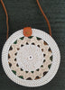 round rattan crossbody bag in wicker vintage style.