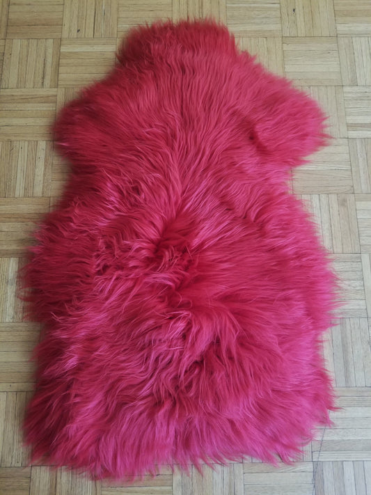 Burgundy pink sheep fur rug