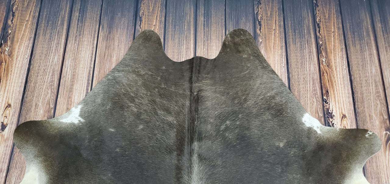 Dark grey cowhide rugs are the perfect addition to any neutral space. Whether you're looking for a unique piece of décor or simply want to add texture and interest, these stylish pieces fit the bill.
