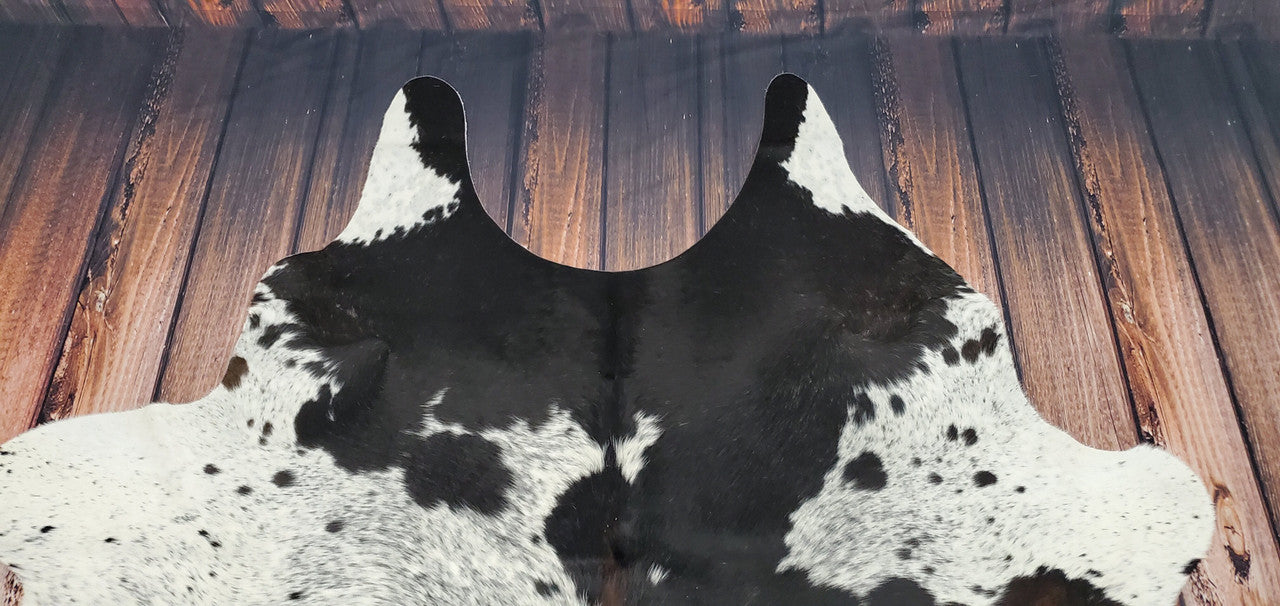 Make a statement in your home or outdoor space with this unique longhorn cowhide rug. Its custom-made design and quality materials make it an ideal choice for interior and exterior styling.