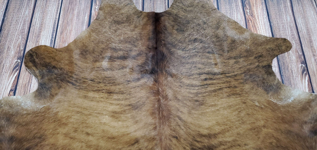 When choosing a brindle cow hide rug, consider the size of the room and the amount of traffic it gets. You’ll also want to think about the colors and patterns you want in your rug.