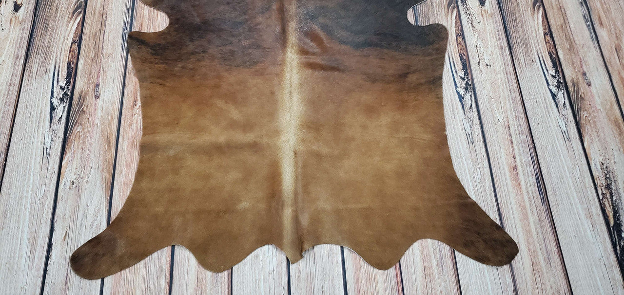 There's nothing like the feeling of walking on a soft, plush rug. And when that rug is made of cowhide, it's even better our Hereford brown cowhide rug will be a great addition to any space.