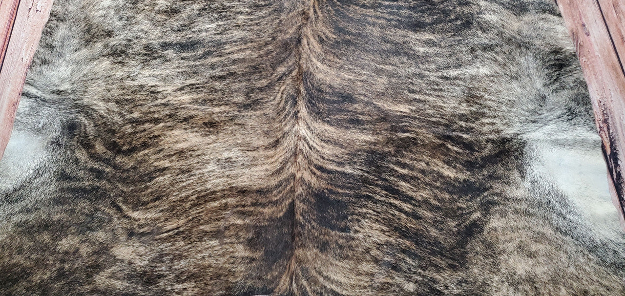 If you are searching for a cowhide rug for upholstering couple of chairs to protect the floor, this is perfect! The pattern and shade is true to the picture and goes well with the rest of the room.