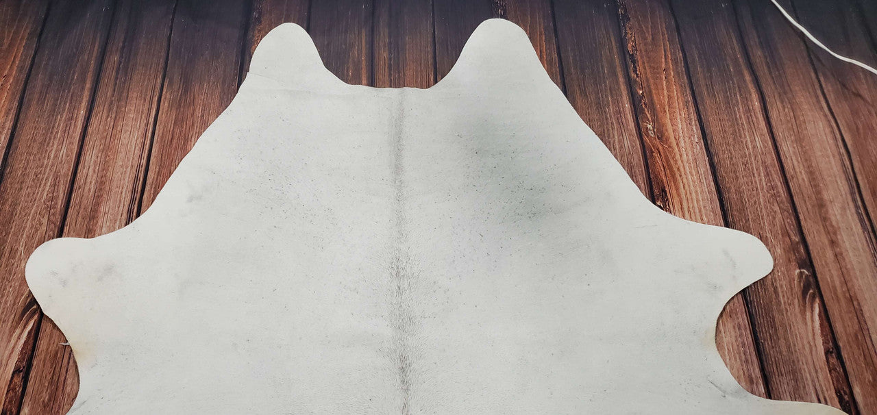 Create a warm and inviting space with an ivory cowhide rug. Add natural elements to your home in a stylish way that will provide lasting beauty for years to come.