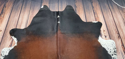 A Canadian cowhide rug is a natural product that is durable and easy to care for. You can simply vacuum it or wipe it down with a damp cloth to keep it clean.
