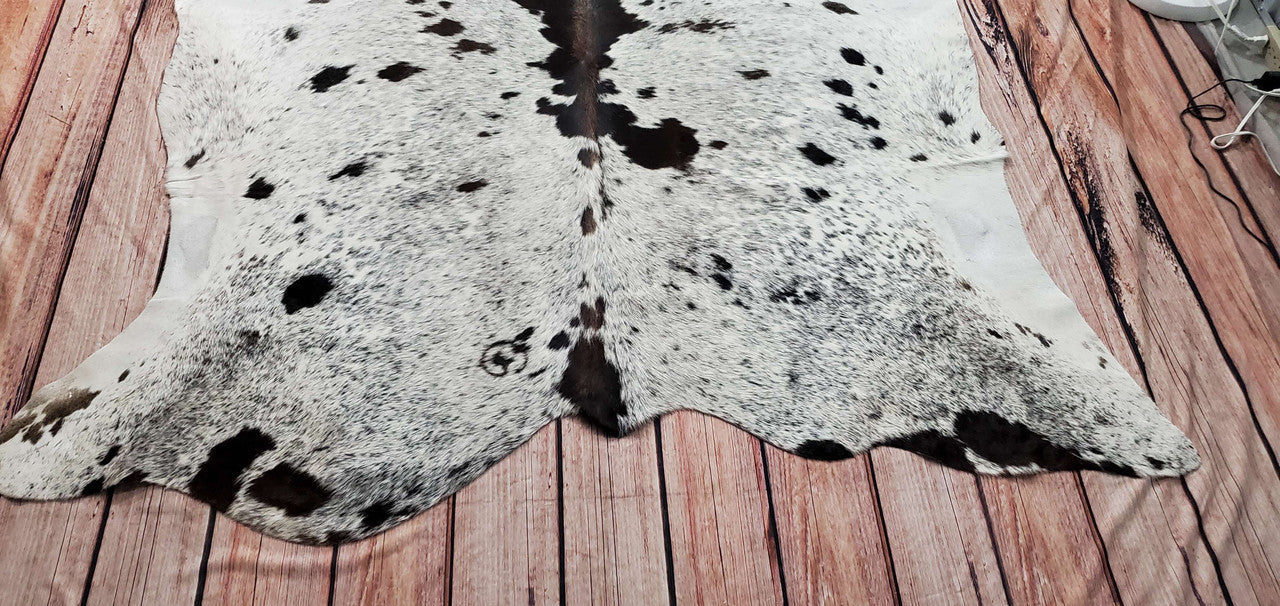 Cowhide rug are a perfect touch, looks like a nature on your floor, adorn on parent's bed on top of the comforter.