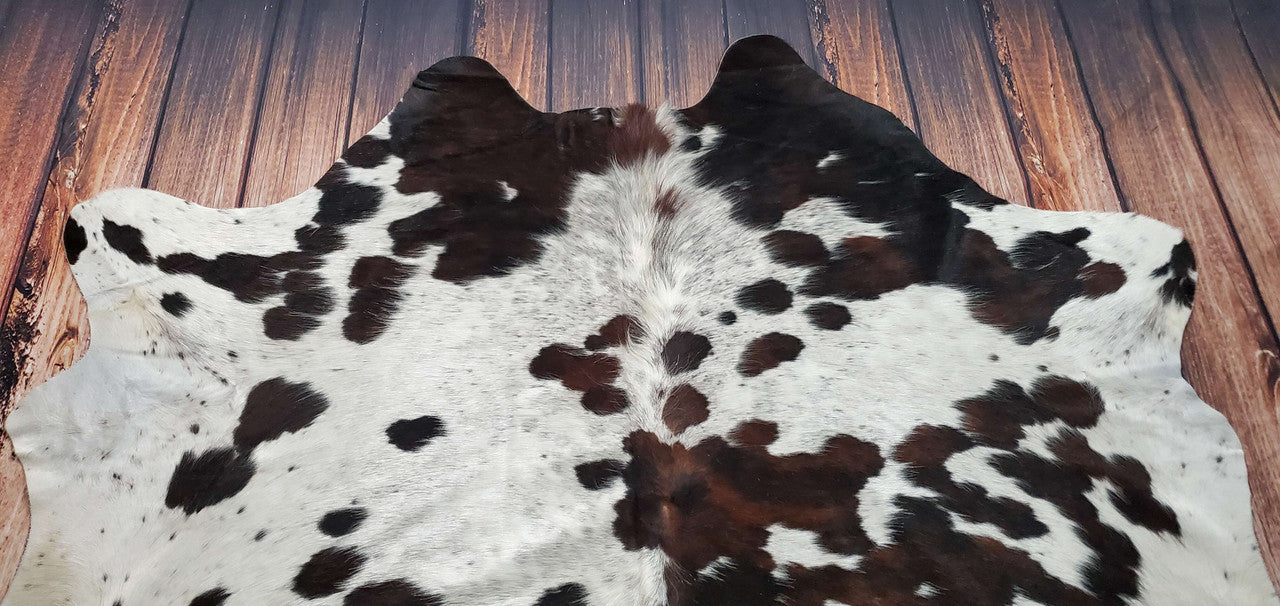 This cowhide rug Is so stunning, its large, exotic and one of kind salt and pepper cowhide rug