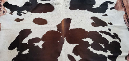 This large cowhide rug is just what I needed! It really is elegant on the table in my fire place. The discount price was great, too! These cowhides are genuine, natural, and made to last.
