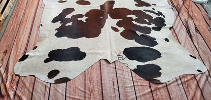 This large cowhide rug is perfect for my home, as I had envisioned. It looks great with my side table in my living room. It arrived on time and was affordable.
