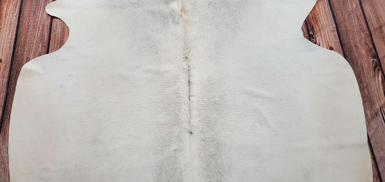 This cowhide carpet is beautiful! The cream and gray enhance a rustic ambiance to our cottage. The quality is terrific.