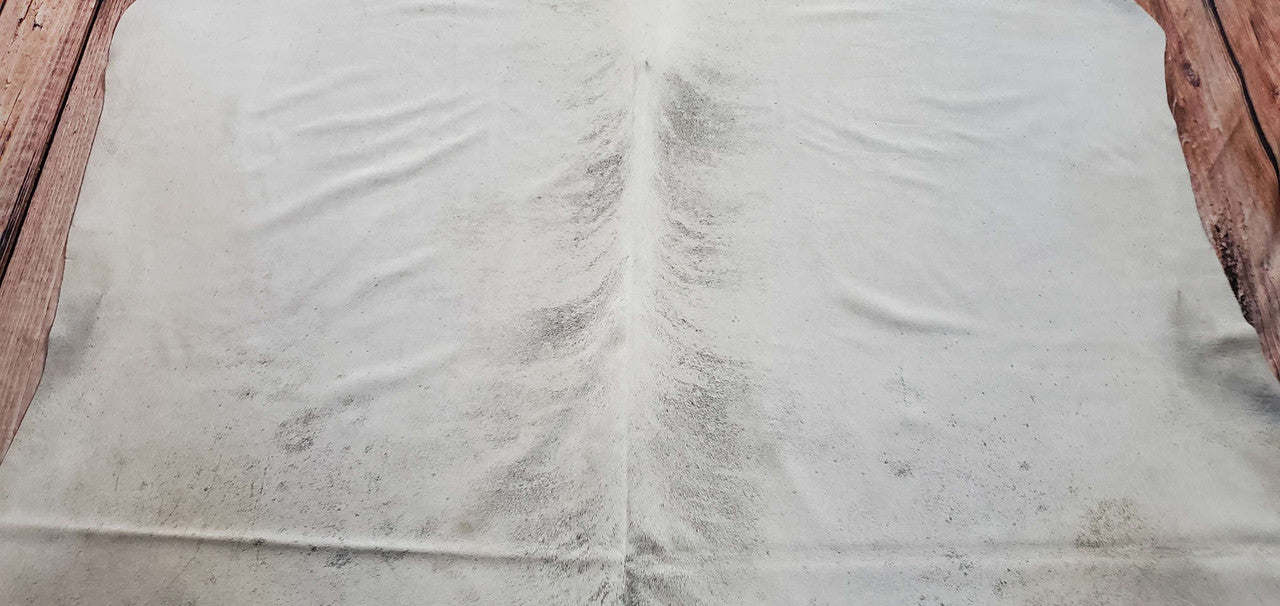 Large brindle cowhide rugs provide substantial visual interest, unique structure, and form a beautiful focal point in any room.