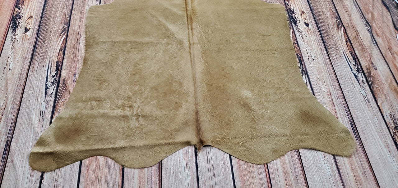 A cowhide Canada with a bright, bold pattern can be a great focal point in a simple room. If you have pets or children, you'll want to choose a durable cow hide carpet that is easy to clean. Some rugs are treated with chemicals that make them resistant to stains and spills.