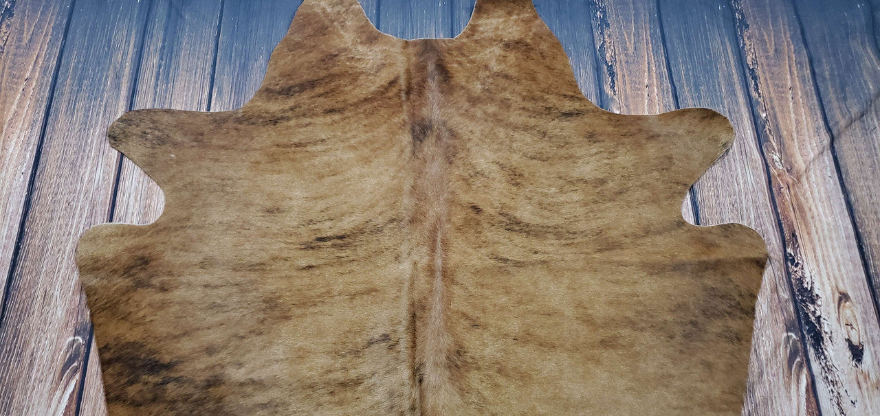 This cow hide rug adds a soft, smooth, and genuine feel to any room. Its colors and textures add unique character and interest to any room of your home, bedroom, or office.