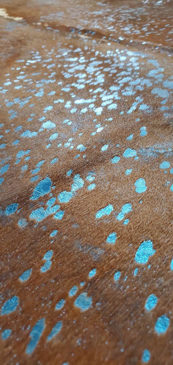 I am very pleased with this beautiful cowhide rug that completes my living room. It's western style and looks great on my hardwood floors.