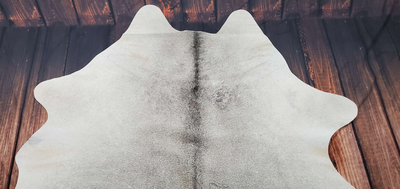 A beautiful small cowhide rug, perfect for any room.