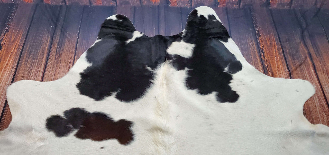 I think Christmas time is the time to add another level of comfort to your living space, one way to do this is by adding a cowhide rug that has a speckled or salt pepper design.