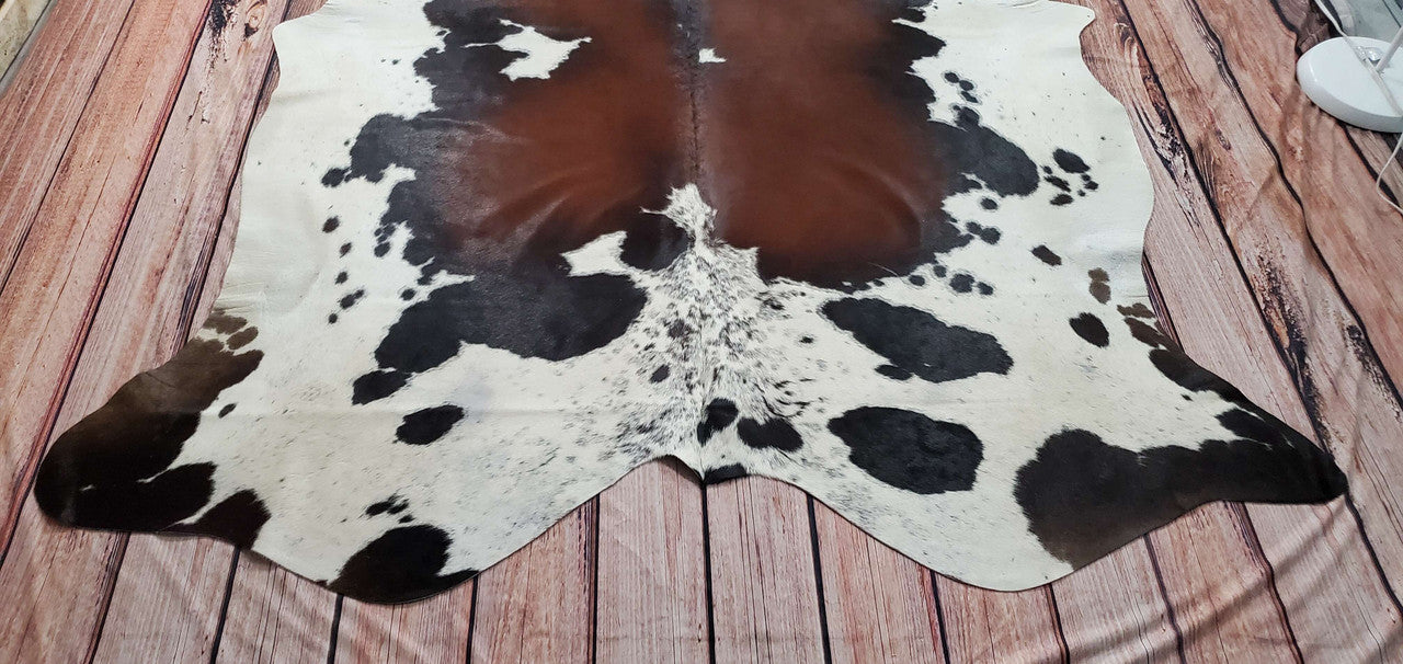 Invest this speckled cowhide rug in your room and it will become a cozy place to relax that will offer a dash of contrast to the remainder of your furnishings.
