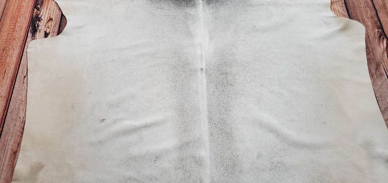 This light grey cowhide rug is perfect any interior, is extremely soft and inherently authentic. It was particularly hand-picked from Brazil for a distinct pattern.