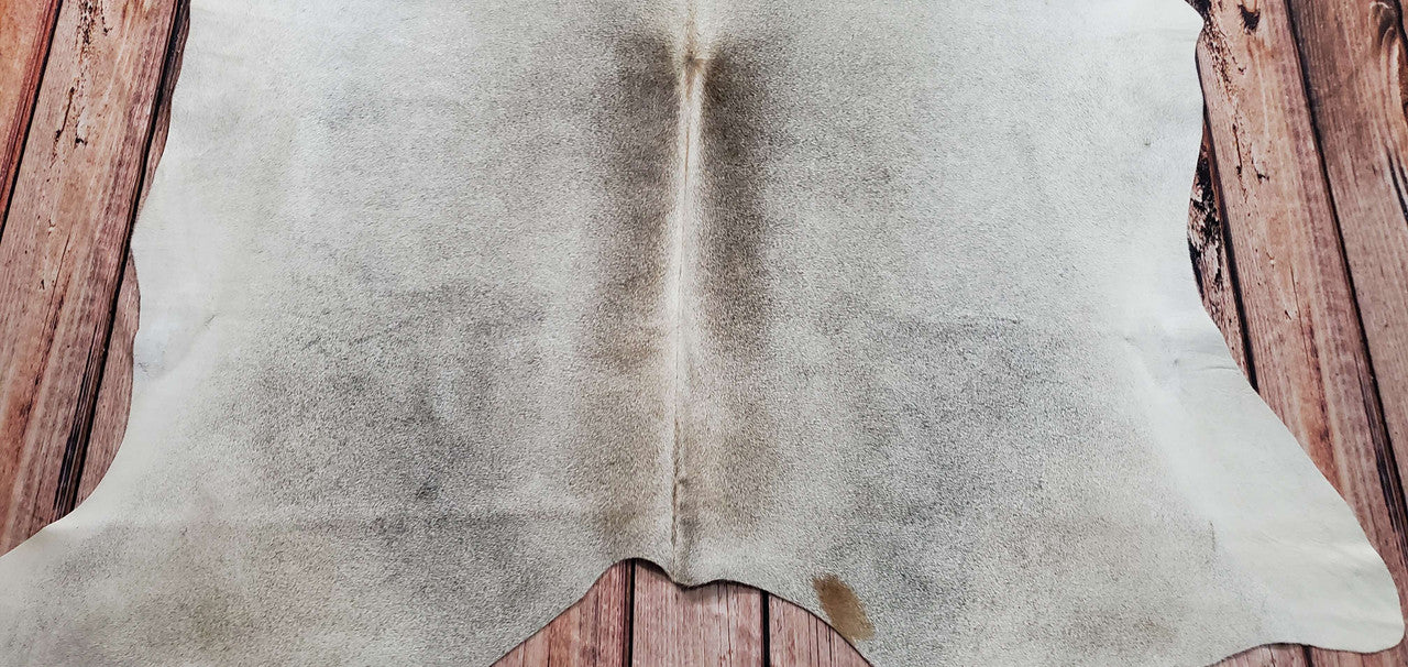 I'm so blissed with my remarkably lovely natural cowhide rug that any tones are more vibrant when seen in person, extraordinarily gentle, and plush.