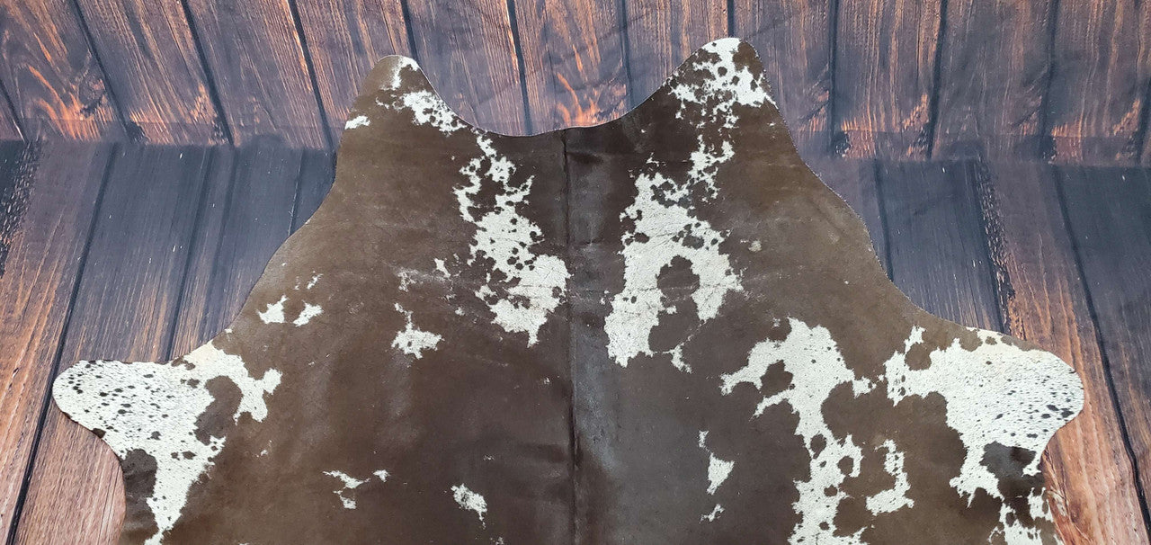 If you want to add vibrant hues to your setting, this tricolor cowhide rug is a great choice.