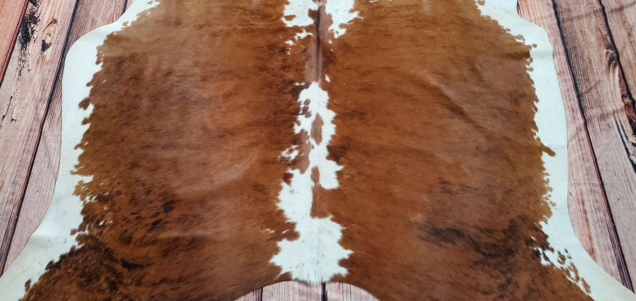 Genuine cowhide runner rug will look stunning in any space weather natural or modern open concept.