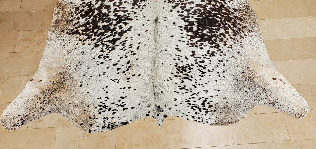 Elevate your decor with exquisite cowhide accents. Explore a diverse range of elegant cowhide furnishings and accessories.
