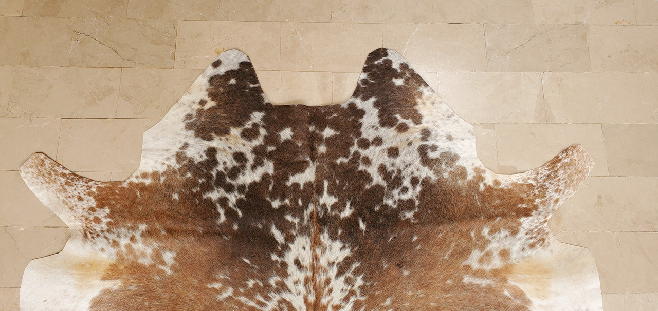 The natural colors of the cowhide Canada are versatile enough to match any existing furniture or decor, adding a rustic touch while remaining tasteful.