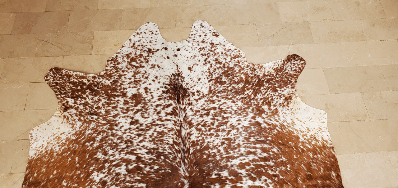 A small tricolor cowhide rug performs beyond expectations, being real, soft, and beautiful. These cowhide rugs are free shipping all over Canada