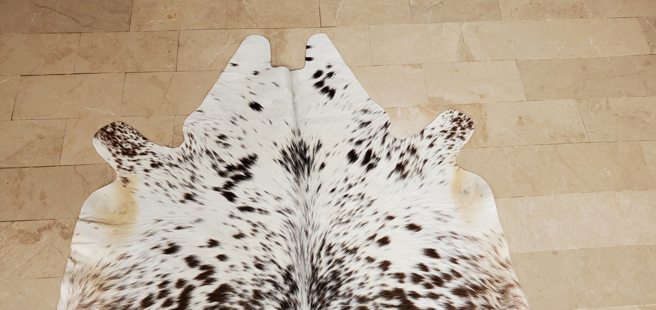 These rugs add a lovely contact with color to the interior of the room. They're low, organic, and exclusive Brazilian cowhide rugs. Gorgeous cowhide rug! It really makes western style bedroom pop with color. It’s extra-small, real and high-quality Brazilian.