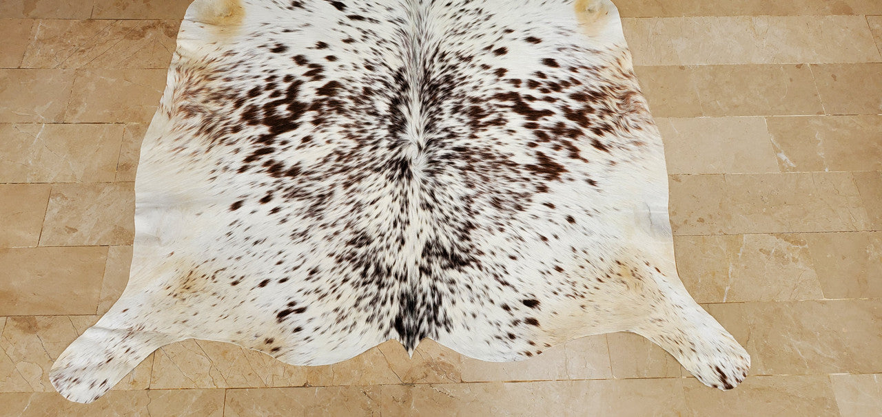 Gorgeous cowhide rug! It really helps to deck out my mother's space with rich tones. Its size is compact, sleek and rather natural, which is why my mother likes it so much.