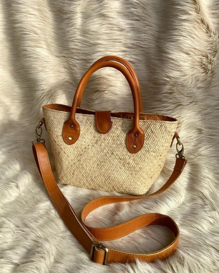 A rattan bag is a great option for a picnic, as it can easily be carried and its natural material helps keep your food cool.