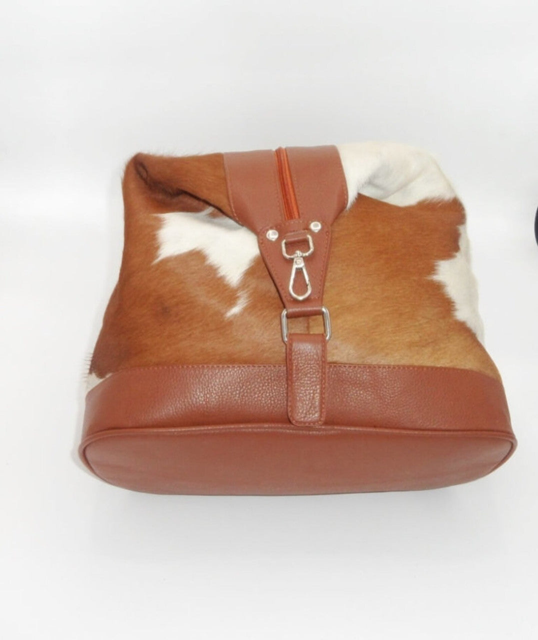 Find your perfect accessory with our stunning cowhide bags. Experience the beauty and versatility of genuine cowhide in every design.