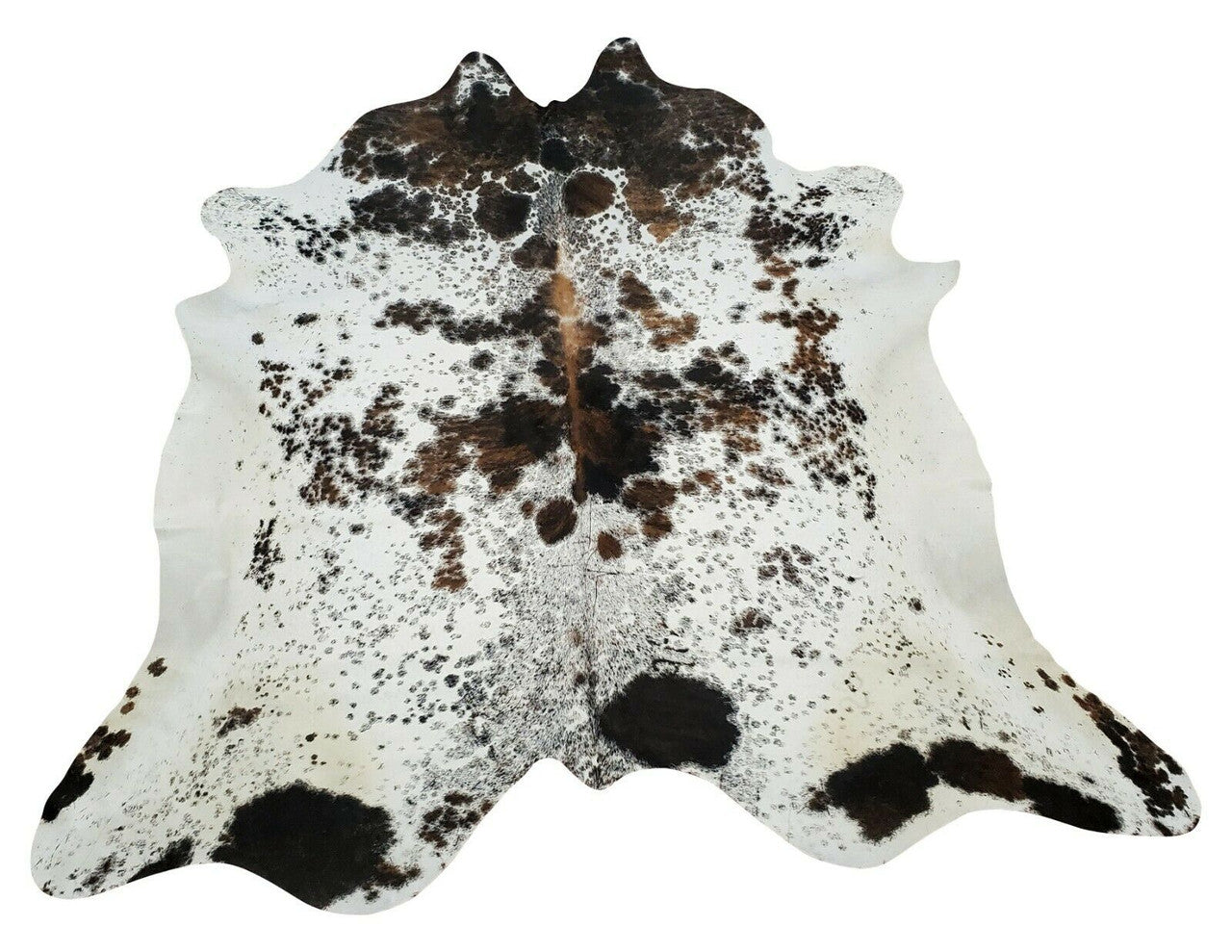 A large, natural, real speckled cowhide rug is the perfect way to add a touch of rustic elegance to your home.