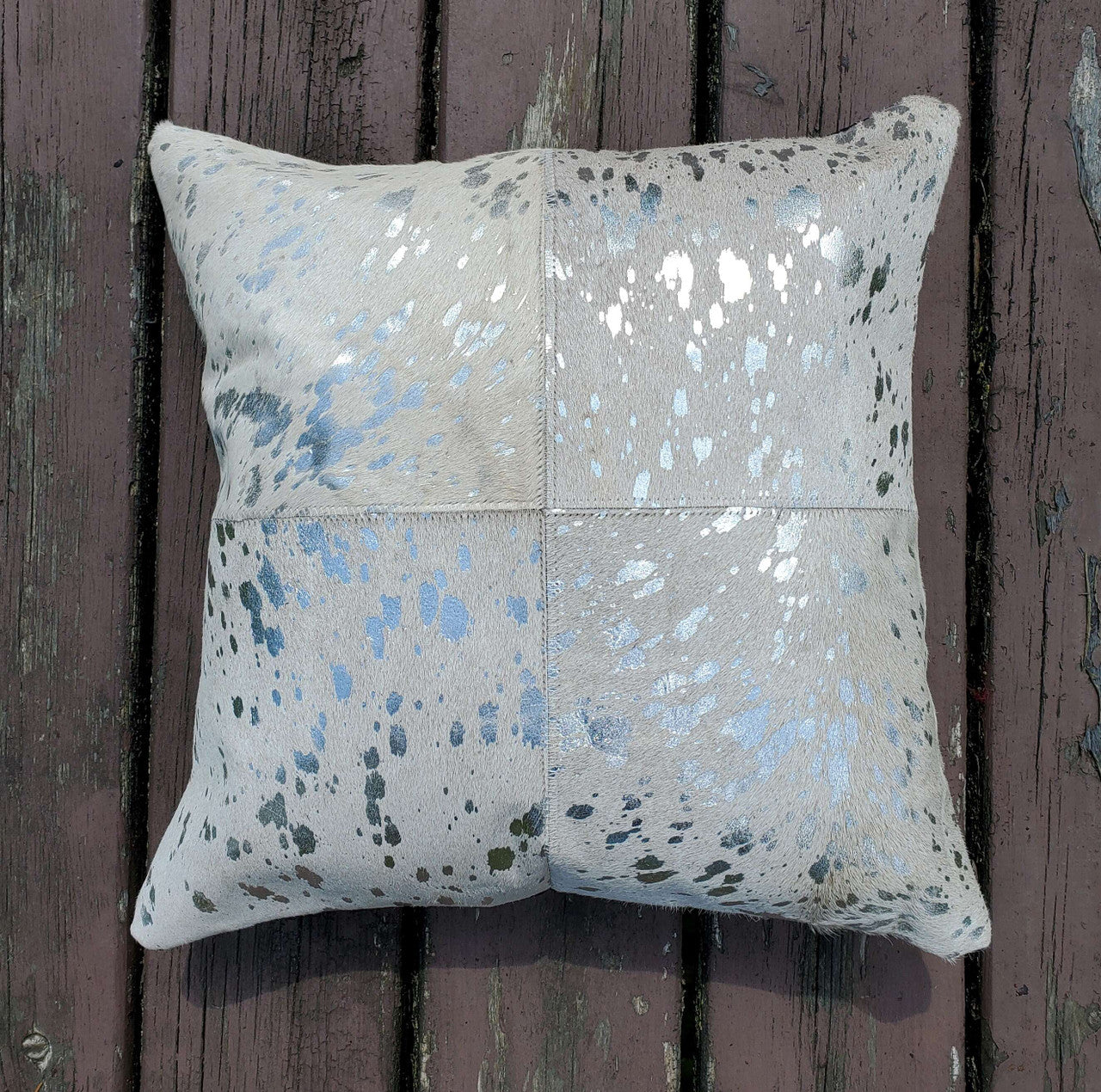 You will be obsessed with these cowhide pillow covers, which come in stunning silver metallic and very soft and smooth to touch.