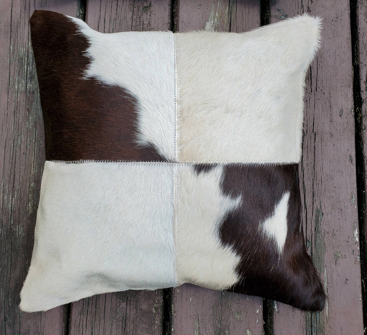 Photos don’t do them Justice to these cowhide rugs, natural and real.