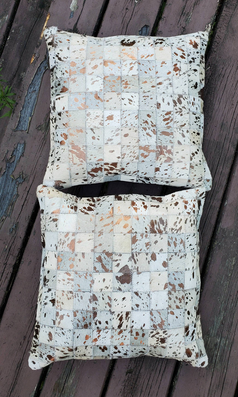 These beautiful one of a kind cowhide cushions are so soft and well made, natural and real metallic on patchwork hide.