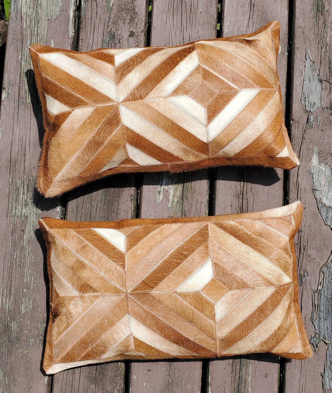 Our lumbar pillows are of beautiful quality and finished with stunning craftsmanship and the brown white balances the whole space.