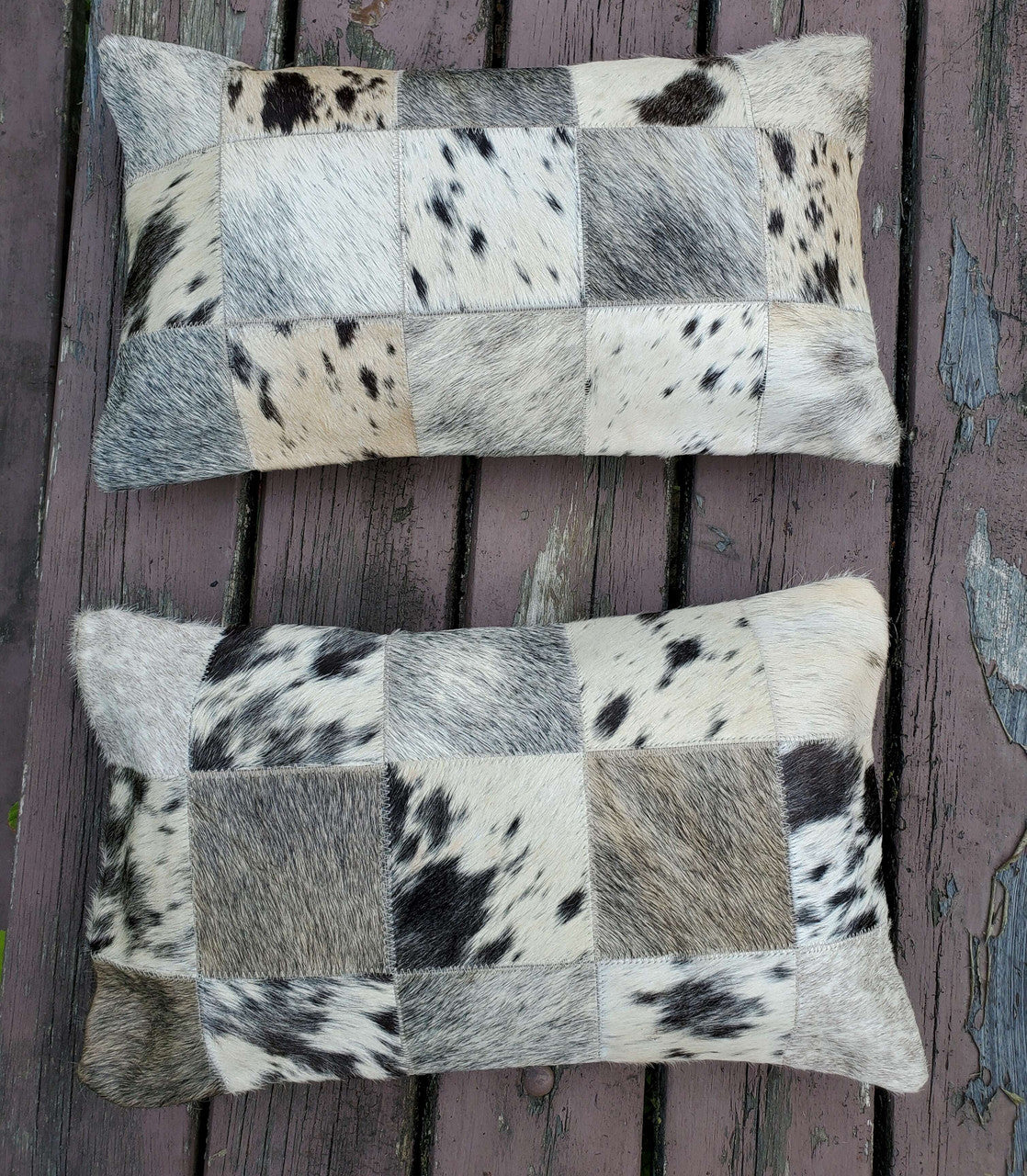These lumbar cowhide pillows are gorgeous, the most beautiful shade of black grey cowhide fabric and very well made.