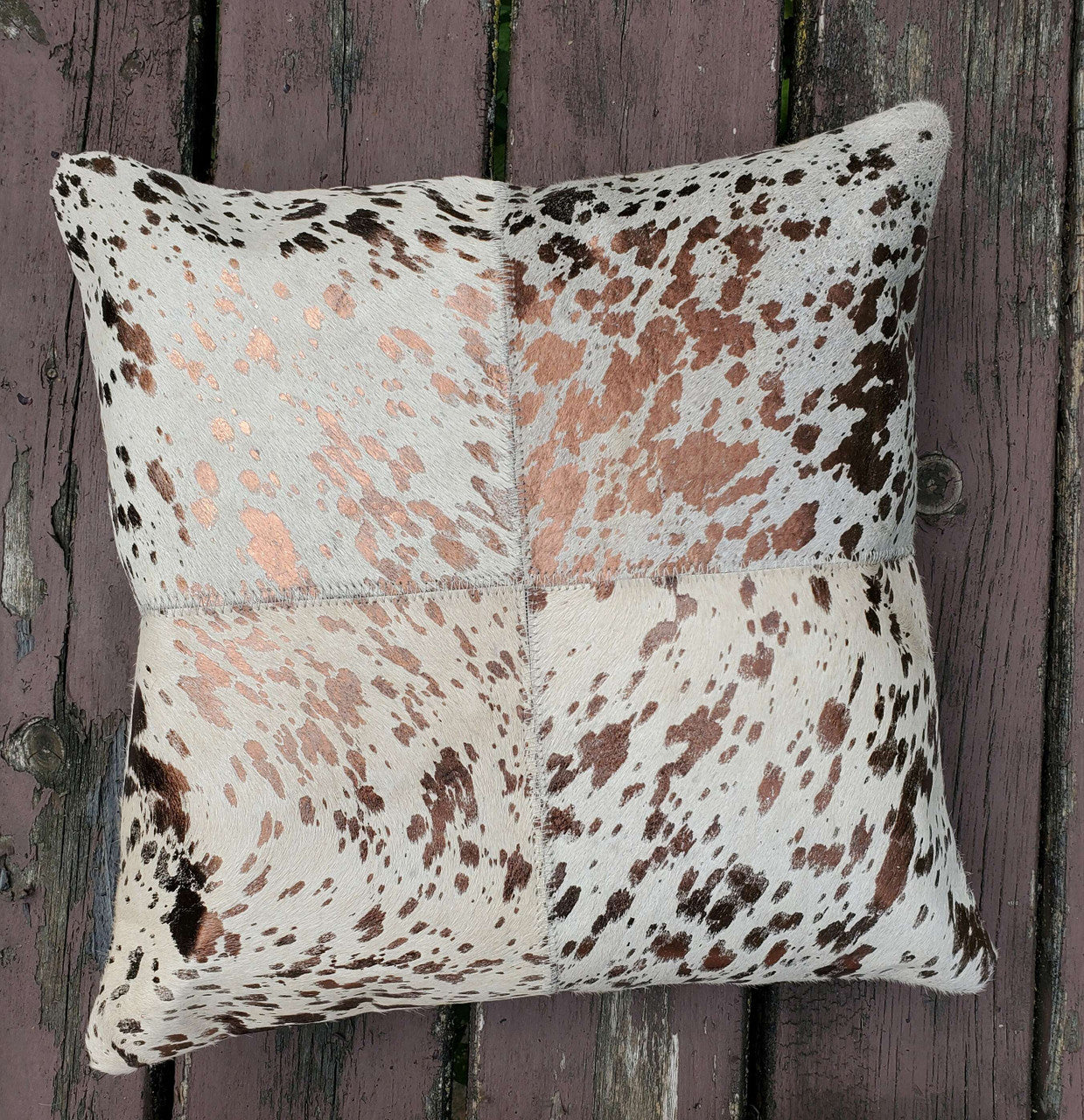 These cowhide pillow are exactly shown, work is of highest quality and the metallic cowhide is very attractive. It looks just like the photo.