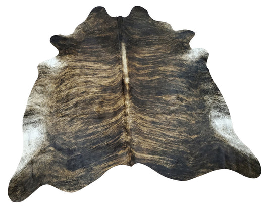 This genuine cowhide rug in one of a kind dark brindle is perfect for any space whether it's a modern living room or a country-style entryway. 