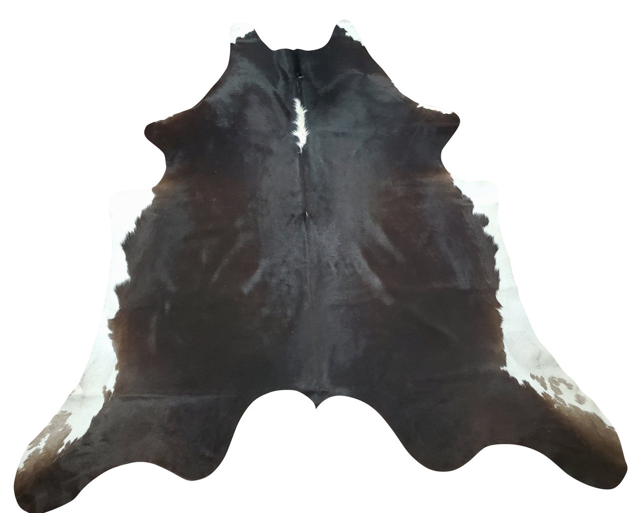 This small, dark cowhide rug is perfect for adding a touch of rustic charm to any room, The natural speckling of the cow hide adds interest and texture