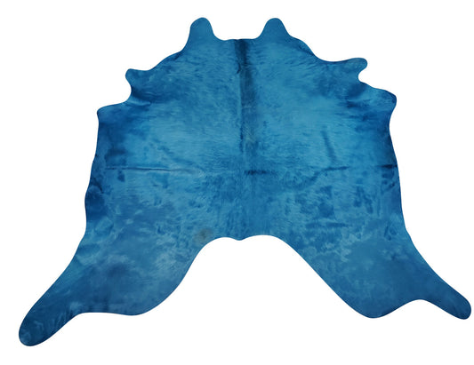 A stunning small dyed turquoise cowhide rug is and totally recommend in homes with pets, children or wine drinkers.