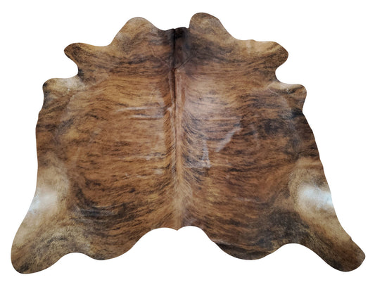 Exotic brown brindle cowhide rug that looks exactly like picture, exceptional quality and the perfect size and will be great for living room.
