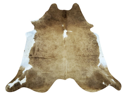Authentic and natural brown white cowhide rug, we make sure each cow skin is hand-picked and carefully inspected. The Brazilian climate and chromium tanning make these very soft and smooth, there is a very beautiful natural shines which pops up once sunlight touches it. 

