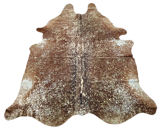 Add cowhide rugs with your furniture and enhance the look of your space, a nice large bookcase against the wall will do the magic.