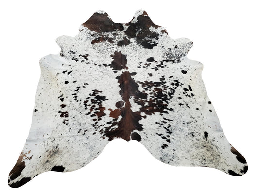 These real black and white cowhide rugs are soft, smooth and pliable to use as cushion covers or upholstery, natural speckled for western touch. 