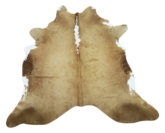 A new exotic light brown palomino cowhide rug that will take your space to another level, super comfortable and soft. 
