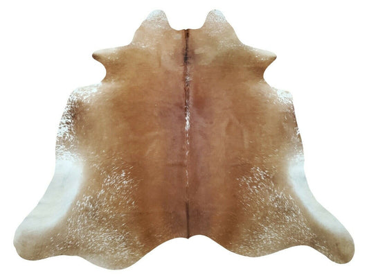 A stunning brown white cowhide rug in a place of entertainment or relaxing is a perfect way spending time with loved ones, these are soft and supple.