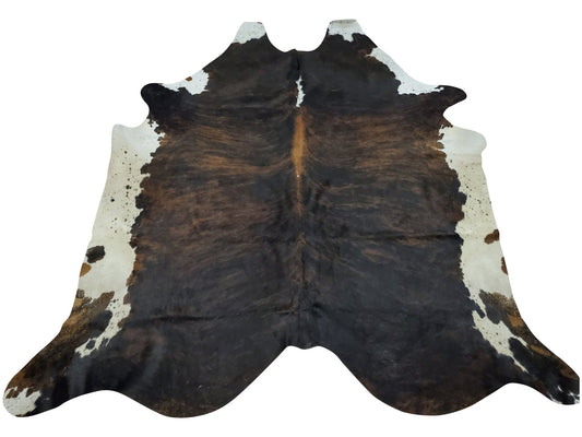 Dark brown white cowhide rugs that are good for your lounge, bedroom and hallways, durable texture makes them last for decades.